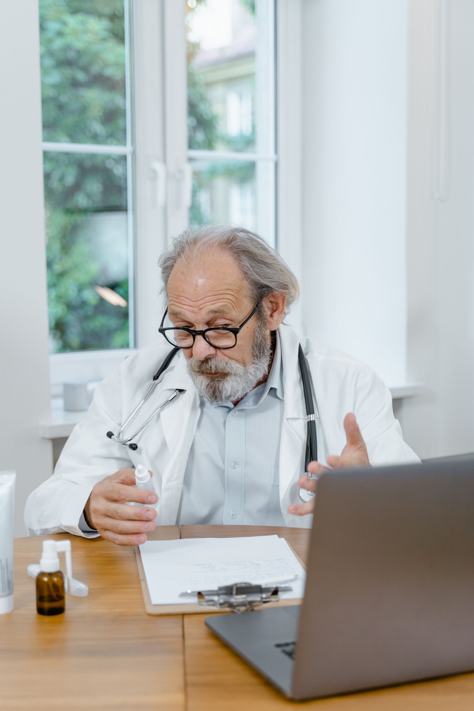 Person in Gujranwala using smartphone for online doctor consultation