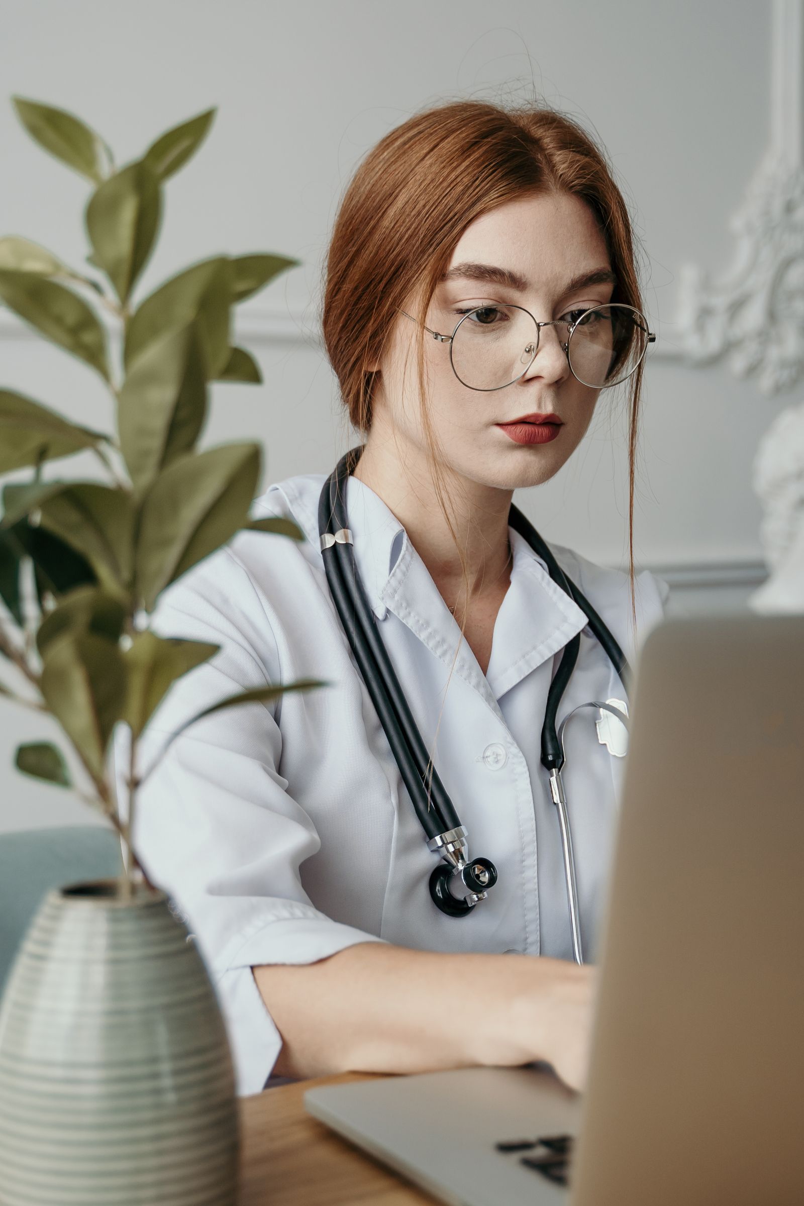 Person in Sialkot using smartphone for online doctor consultation