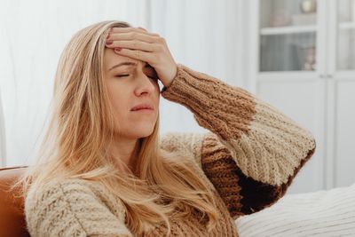 Woman with dizziness — fainting