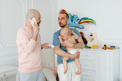 Sick baby being cared for — pediatric illness