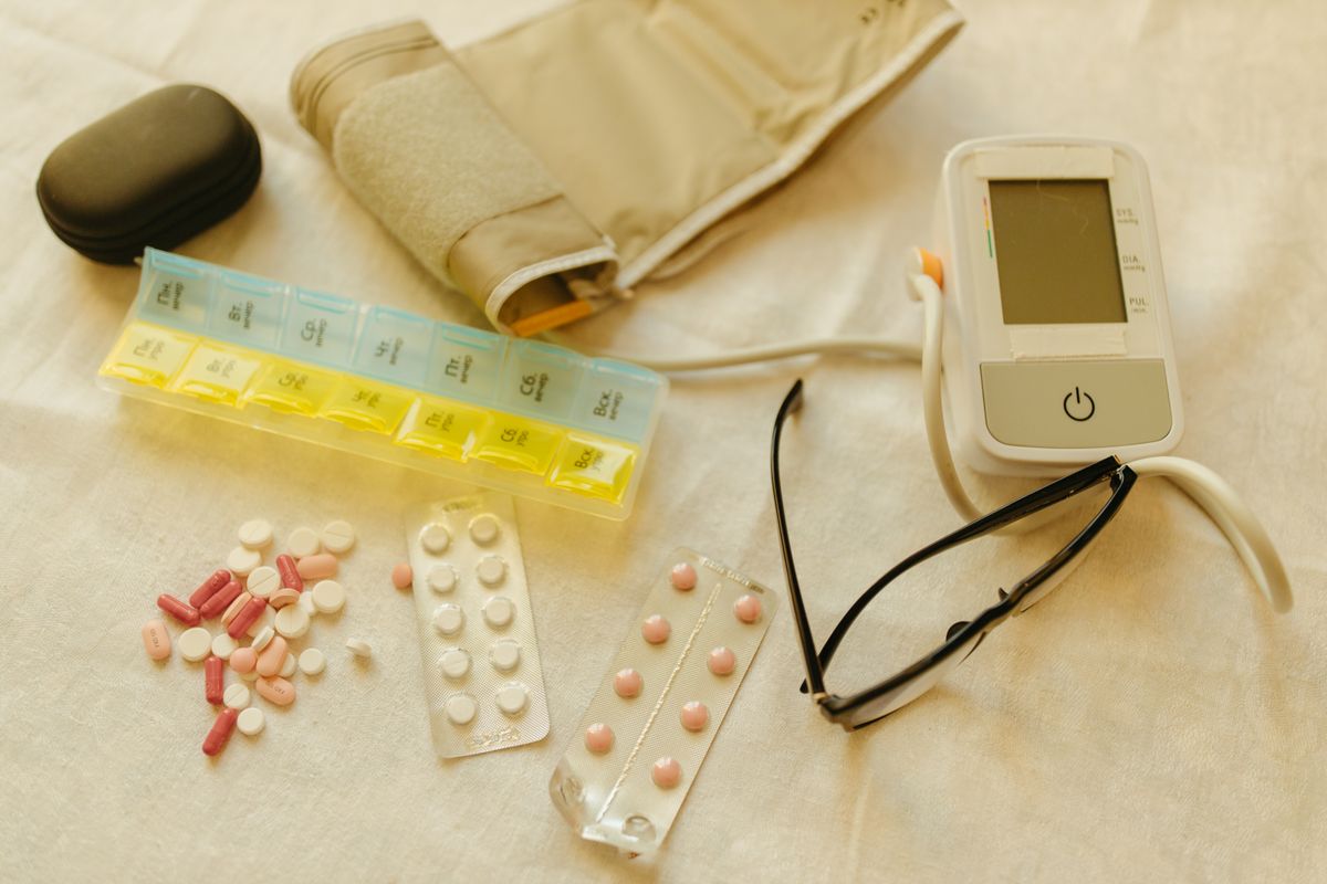 Medicines next to BP monitor — Lasix furosemide