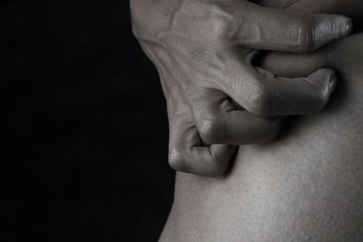 Hand on skin — itching