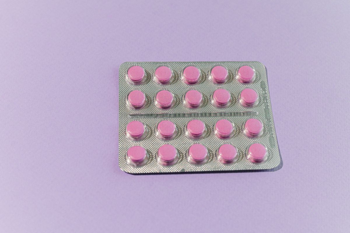 Pink capsule pills — Nexium esomeprazole